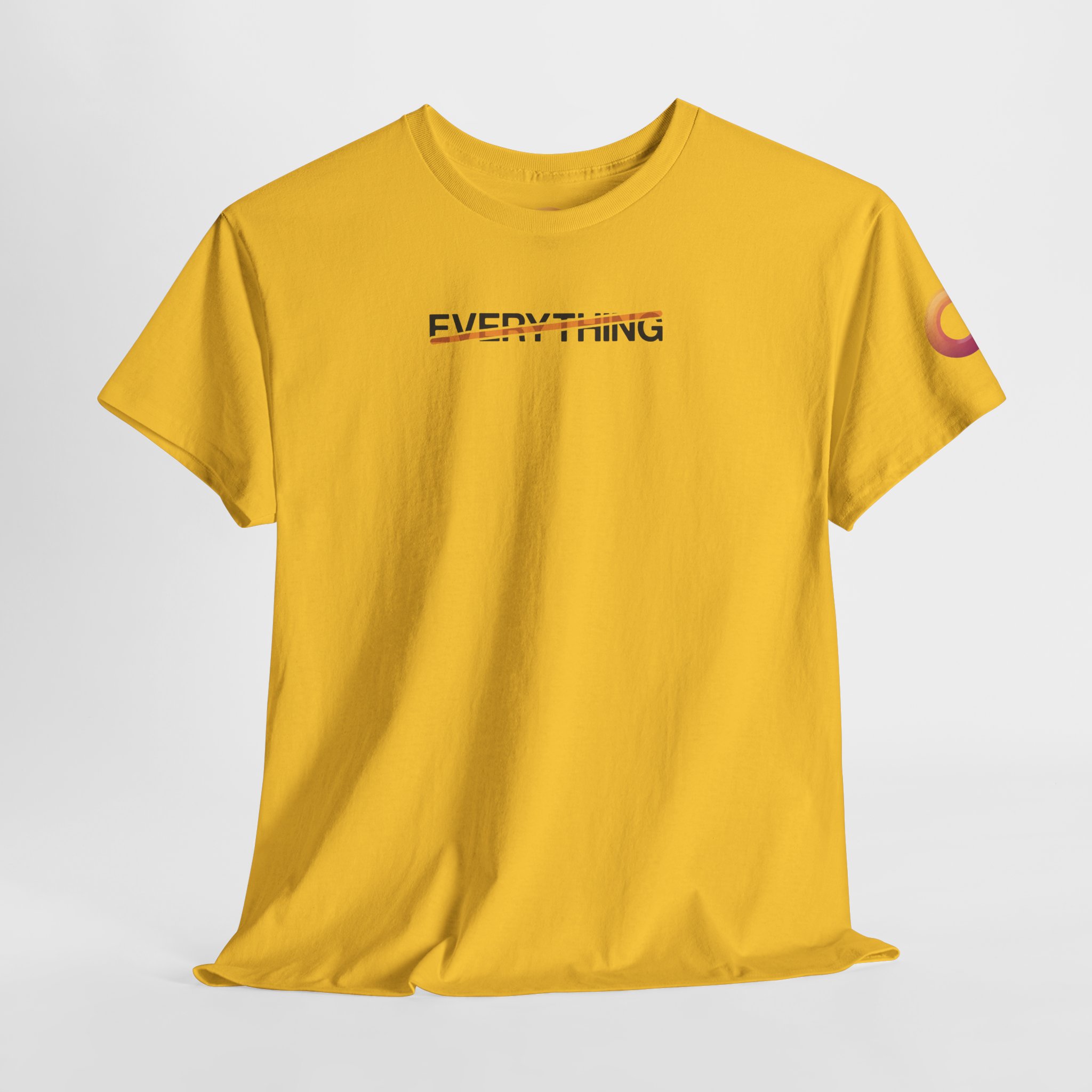 gold t-shirt that says "everything," with an orange stripe crossing it out.